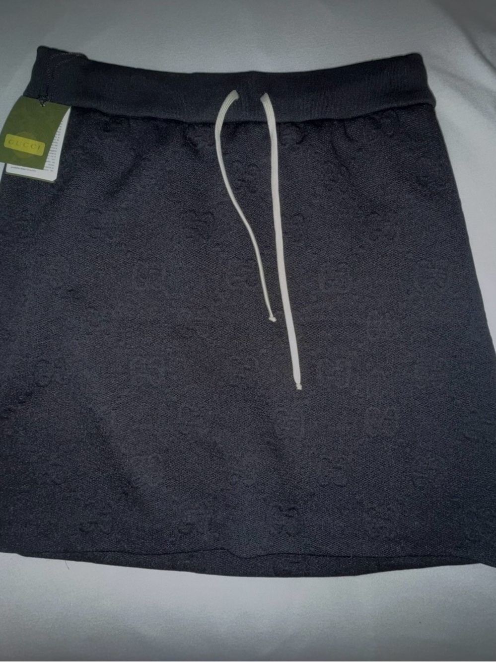 Gucci Black Embossed Logo Drawstring Mini Skirt